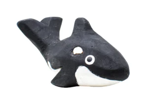 Hand-painted white and black wooden orca toy made from reclaimed wood